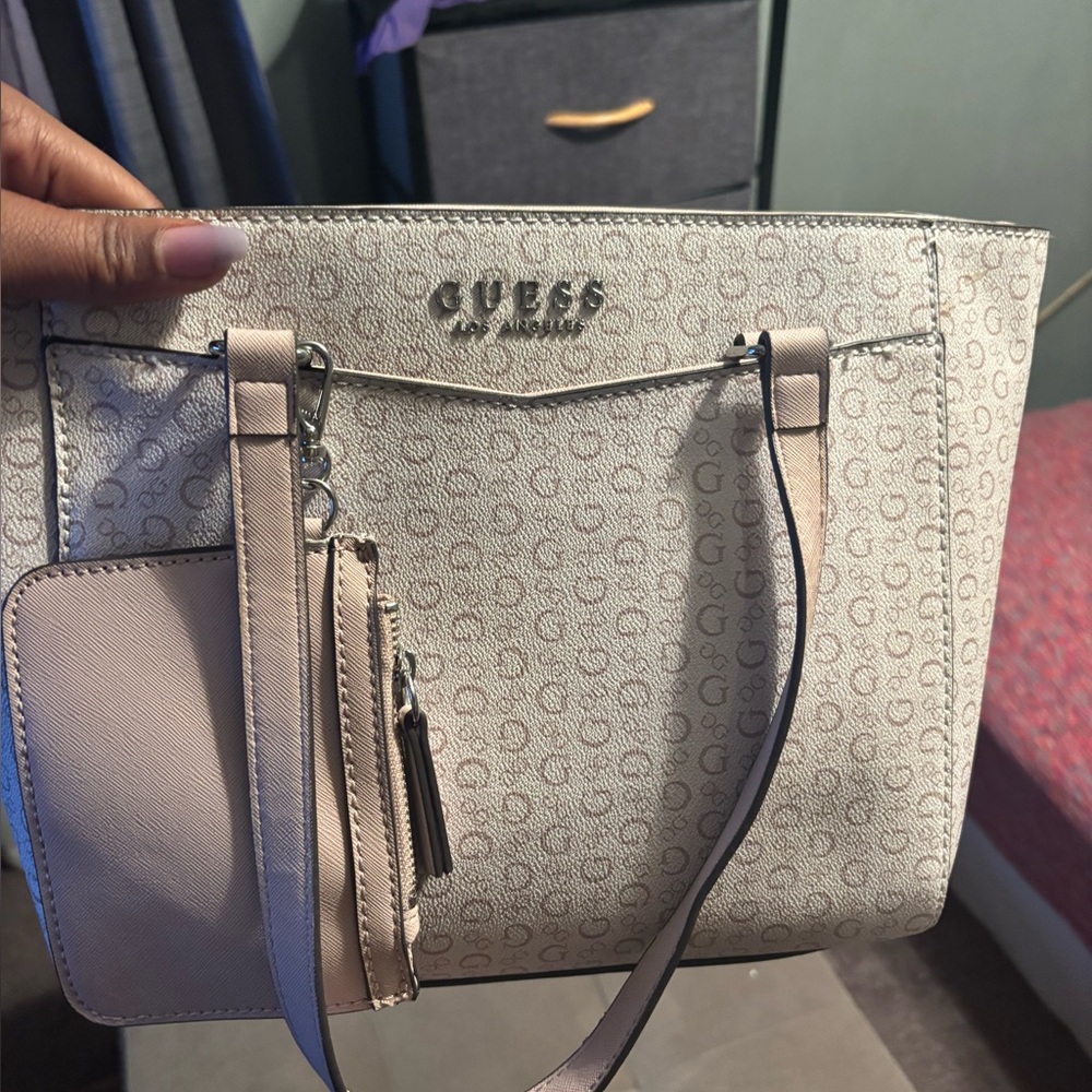 Pink and cream guess purse has a little wallet that came with,